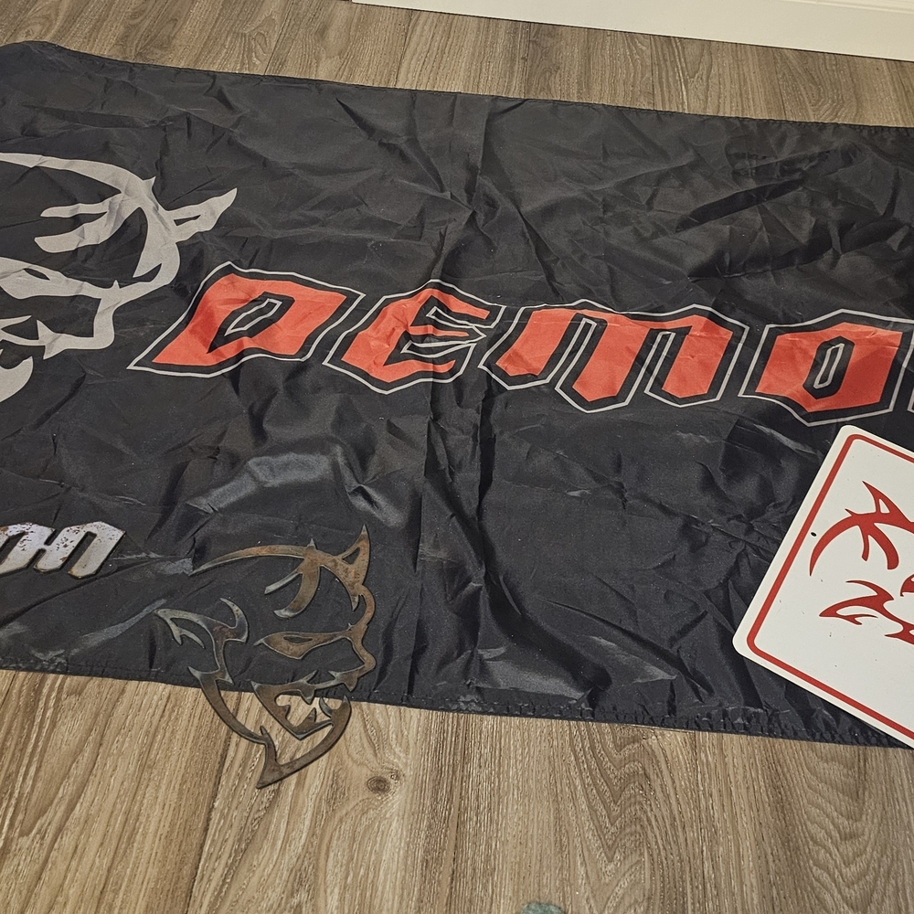 Black Flag with Red 'Demon' Graphic